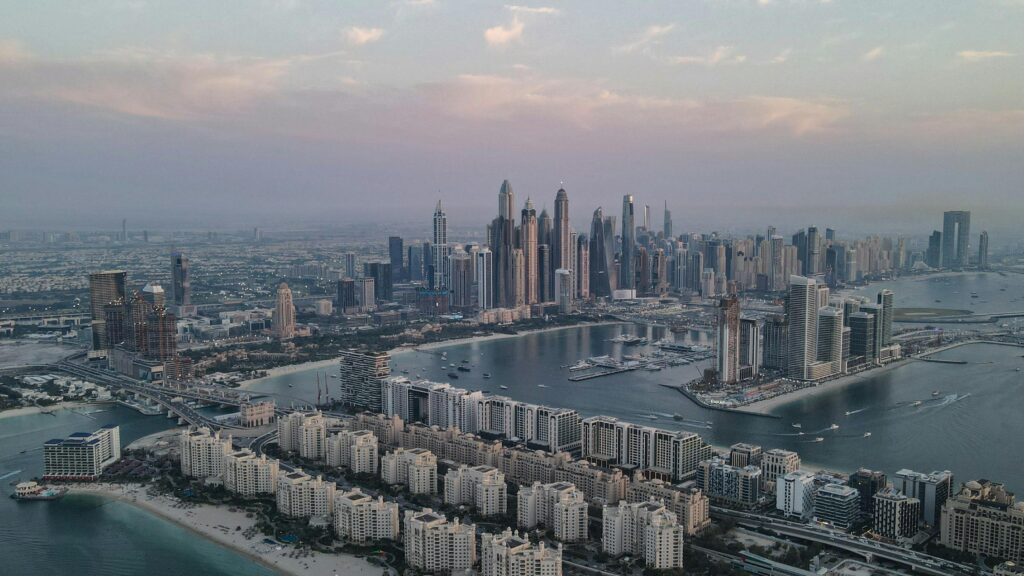Aerial view of Dubai Marina skyline with waterfront and high-rise buildings