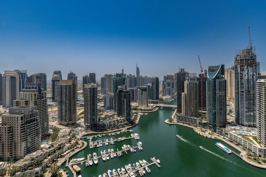 Aerial view of Dubai Marina featuring residential and commercial towers in one of Dubai’s most popular areas for entrepreneurs and expatriates.